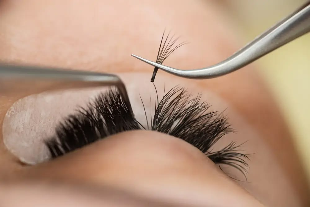 Precise volume fan placement during a hybrid lash full set Etobicoke appointment at La Paige Nails