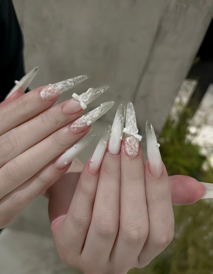 Romantic sheer lace and ribbon bridal nail services Etobicoke on long stiletto tips